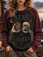Vintage Distressed Stay Creepy Skeleton Hand Anatomical Heart Raglan Sweatshirt